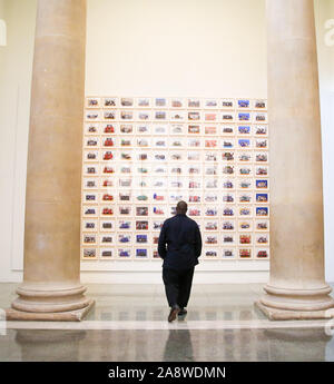 London, UK. 11th Nov, 2019. Turner Prize-winning artist and Oscar-winning filmmaker Steve McQueen during the preview of his Year 3 exhibition at Tate Britain. An installation of over 3,000 class photographs lining the walls of Tate BritainÕs Duveen Galleries, depicting more than 70,000 Year 3 pupils from LondonÕs primary schools.The exhibition opens on 12 November until 3 May 2020 Credit: Dinendra Haria/Alamy Live News Stock Photo