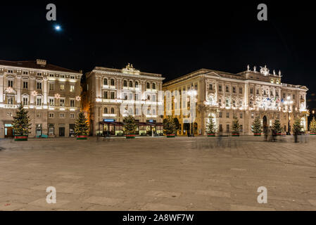 Night in Trieste. Historic buildings and magical atmosphere on the water. Stock Photo