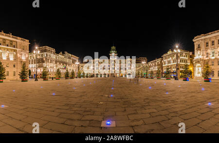 Night in Trieste. Historic buildings and magical atmosphere on the water. Stock Photo