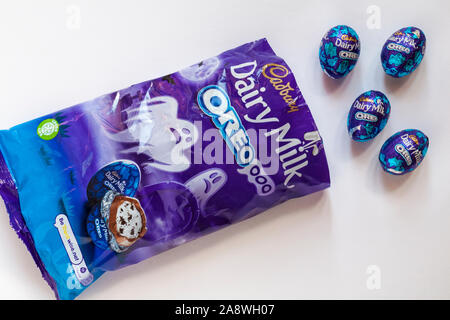 Bag of Cadbury Dairy Milk Oreo Oreoooo isolated on white background milk chocolate with vanilla flavour filling and biscuit pieces ready for Halloween Stock Photo