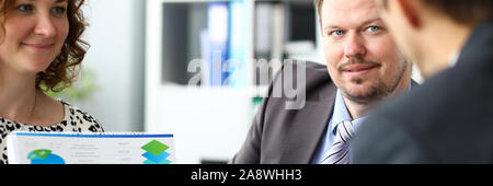 Friendly team working at new start-up Stock Photo