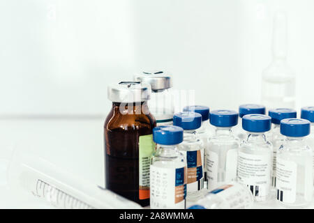 Medicine bottles, ampules, on white background with copy space for text, treatment medication concept closeup Stock Photo