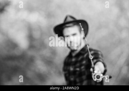 https://l450v.alamy.com/450v/2a8wn2d/hook-and-bait-fishing-hobby-guy-in-cowboy-hat-fishing-equipment-nature-background-defocused-hipster-fisherman-hold-rod-spinning-selective-focus-hope-for-nice-fishing-fishing-day-proper-fishhook-2a8wn2d.jpg