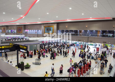 Bangkok,Thailand - Oct 29,2019 : Passengers are queuing to check in at the counter in Don Mueang International Airport. Stock Photo