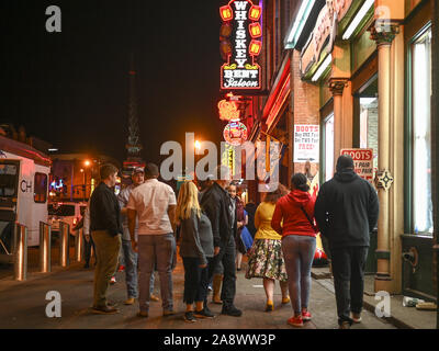 Broadway by night in Nashville. This historic street is famous for its nightlife and country music bars. Stock Photo