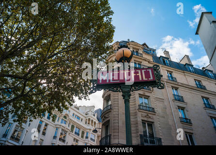 Looking up at sign while exiting subway station near Place Saint-Michel in central Paris Stock Photo