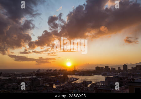 GENOA, ITALY, NOVEMBER  5, 2019 - Aerial view of Genoa, Italy at sunset, the harbor with the hiistoric centre, Italy, Europe Stock Photo