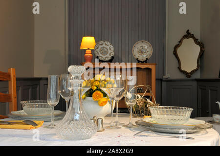 Dining table is set for a holiday dinner Stock Photo