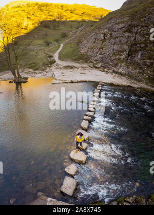 Aerial views of the stunning Dovedale stepping stones and mountains in the glorious Peak District national park, the meandering river Dove flowing Stock Photo