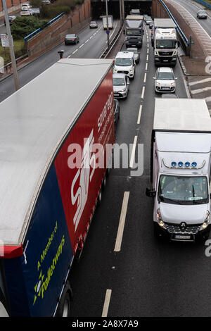 Logistic lorries and haulage vehicles, cars and work transport stuck in a traffic jam, stand still, congestion, gridlock on the A50 by Meir tunnel Stock Photo