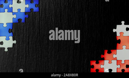 Red, blue and white puzzles in the corners on a black slate stone background. The colors appearing on the flags: Croatia, Dominican Republic, France, Stock Photo