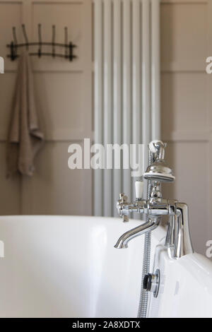 Luxury bathroom interior with classic rolltop bath tub and vintage tap Stock Photo