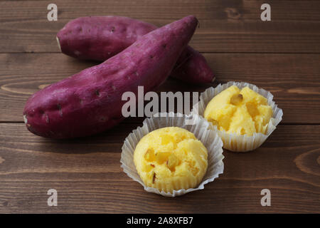sweet potato steamed bread cupcake muffin isolated on table Stock Photo