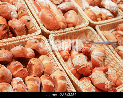 Bun in shopping baskets. shop baking. Prescription. Stock Photo