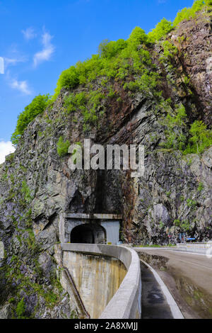 View of the road and the tunnel through the mountain, selective focus Stock Photo