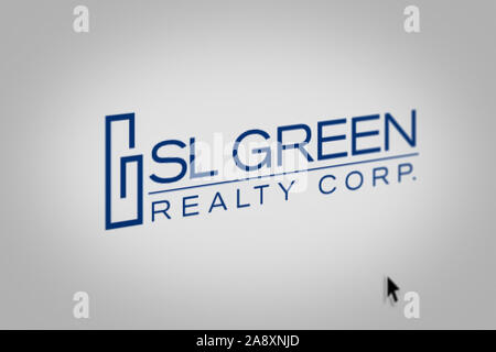 Logo of the public company SL Green Realty displayed on a computer screen in close-up. Credit: PIXDUCE Stock Photo