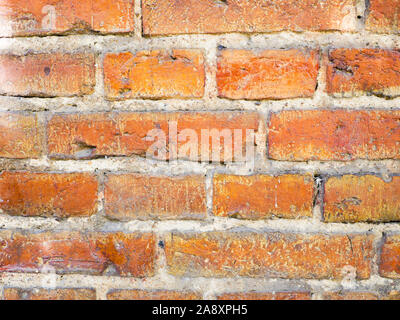 old orange brick wall. Colorful old british red brick wall background. Close-up Stock Photo