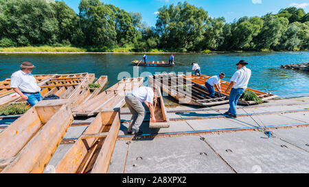 Sromowce Nizne, Poland - August 26, 2015; Traditional rafting on the Dunajec River on wooden boats. The rafting is very popular tourist attraction in Stock Photo