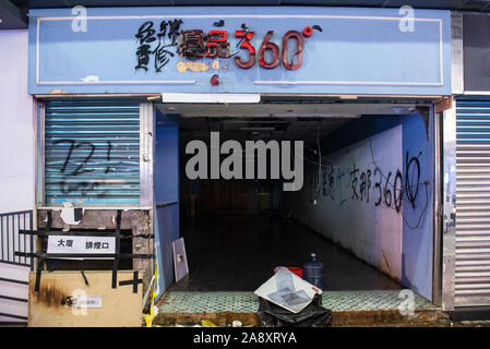 Hong Kong, China. 11th Nov, 2019. An out of business and vandalised Best mart 360 store seen during the demonstration.Anti-government protesters organized a general strike, setting up road barricades and vandalize Hong Kong´s MTR subway stations as demonstrations continued into its five months. Credit: SOPA Images Limited/Alamy Live News Stock Photo