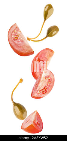 floating parsley and tomatoes isolated on white background Stock Photo