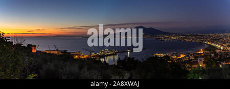 Wide panoramic view at sunset of Castellammare di Stabia, Mount Vesuvius and the Gulf of Naples, Campania, Italy Stock Photo