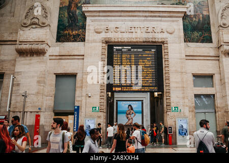 Italy, Milan, July 12, 2019: View of the interior and a lot of people at the train station in Milan. Stock Photo