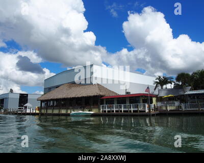 Pop's Tropical Grill and Gulf Harbor Marina along the Intracoastal Waterway in Nokomis, Florida, USA, October 30, 2019, © Katharine Andriotis Stock Photo