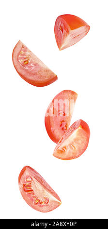 Vibrant falling vegetables isolated on white background Stock Photo