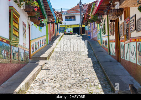 Colourful houses and cobblestone street in the town of Guatapé, Colombia. Stock Photo