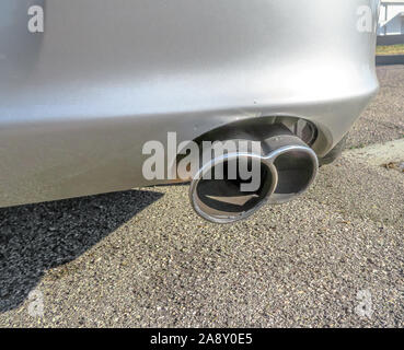 Bologna, Italy - February 6, 2019: exhaust pipe close up of the Porsche 911 sport car or Porsche Carrera 996. Stock Photo