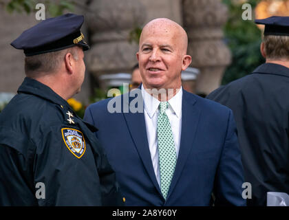 New York, USA,  11 November 2019.  New York City Police Department Commissioner James O'Neill (R) arrives at the Veterans Day Parade. O'Neill will retire from the force on December 1st to become a SVP of Security at Visa.   Credit: Enrique Shore/Alamy Live News Stock Photo