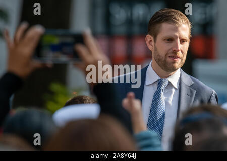 New York, USA,   11 November 2019.  People reach out to photograph Eric Trump, son of US President Donald Trump, as he arrives to attend the Veterans Day Parade in New York City.  Credit: Enrique Shore/Alamy Live News Stock Photo