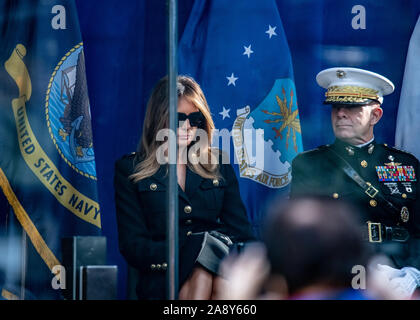 New York, USA,   11 November 2019. US First Lady Melania Trump sits next to military personnel  as his husband President Donald Trump delivers an address behind bullet-proof glass before the start of the Veterans Day Parade in New York City.  Credit: Enrique Shore/Alamy Live News Stock Photo