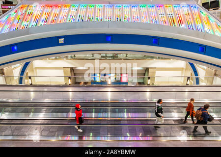 Colorful neon lights decorate a people mover at Denver International Airport; Denver; Colorado; USA Stock Photo