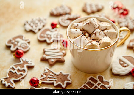 Cup of hot chocolate and Christmas shaped gingerbread cookies Stock Photo