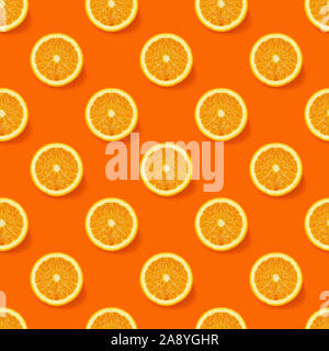 Seamless  pattern with oranges slices on orange background. Flat lay, top view. Creative  concept. Isometric view. Stock Photo