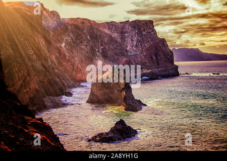 Sunset over Maderia island landscape, Ponta de sao Lourenco. It is a wonderful view of the sea cliffs, Portugal. It is a natural backgroun Stock Photo