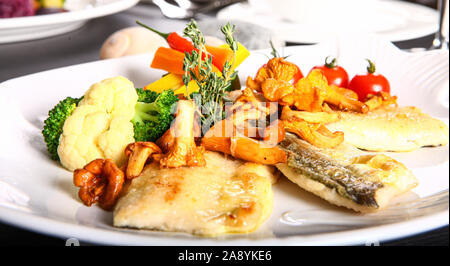 Pizza with tomato, meat and mushroom toppings Stock Photo