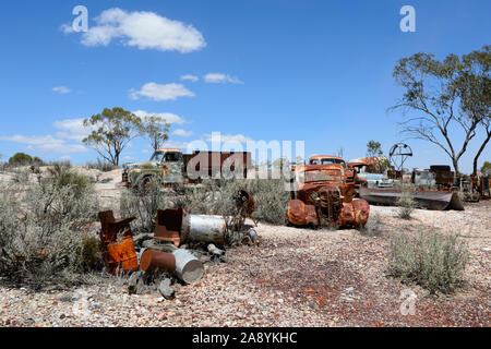 Abandoned rusty truck and mining equipment used in the opal fields of Lightning Ridge, New South Wales, NSW, Australia Stock Photo