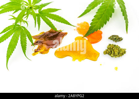 Various Cannabis CBD and THC Shatter rosin extracts with Hemp flowers and leaves, isolated on white Stock Photo