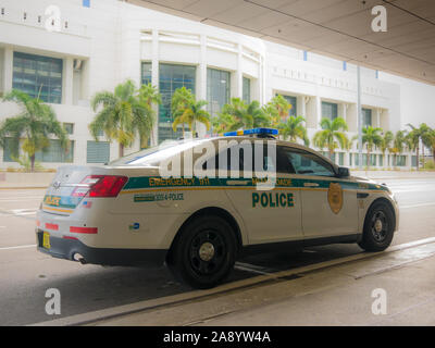 City of Miami police officers patrol on bicycles along Ocean Drive ...