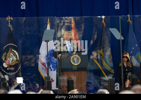 New York, NY - November 11, 2019: President Donald J. Trump speaks during as First Lady Melania Trump listens Veterans Day Parade's opening ceremony at Madison Square Park Stock Photo