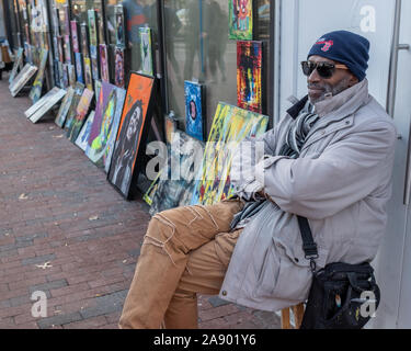 Street artists with their artwork ready for sale in Harvard Square, Cambridge, MA Stock Photo