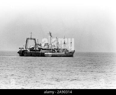 1979 - A starboard beam view of a Soviet trawler anchored offshore during exercise Unitas XX. Stock Photo