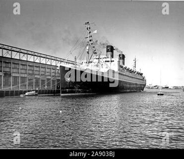 This photograph depicts the Il De France docked. October 12, 1949 Stock Photo