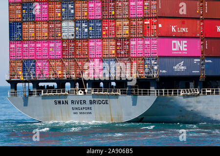 Container ship Swan River Bridge, leaving Fremantle Harbour, Western Australia Stock Photo