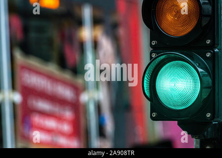A city crossing with a semaphore. Green light in semaphore - image Stock Photo