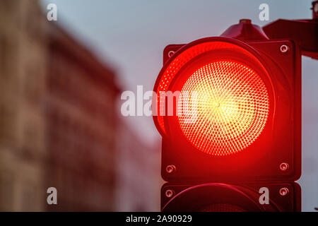 A city crossing with a semaphore. Red light in semaphore - image Stock Photo