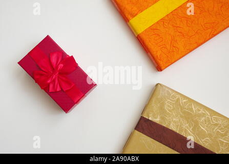 Presents for holiday concept - gift boxes on white background Stock Photo