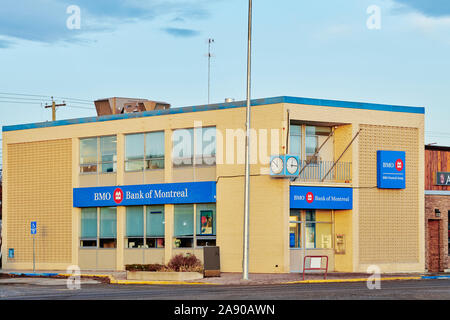 Bank of Montreal is on the main highway through a small town in Southern Alberta. Bank is used by travellers, residents, farmers and local ranchers. Stock Photo